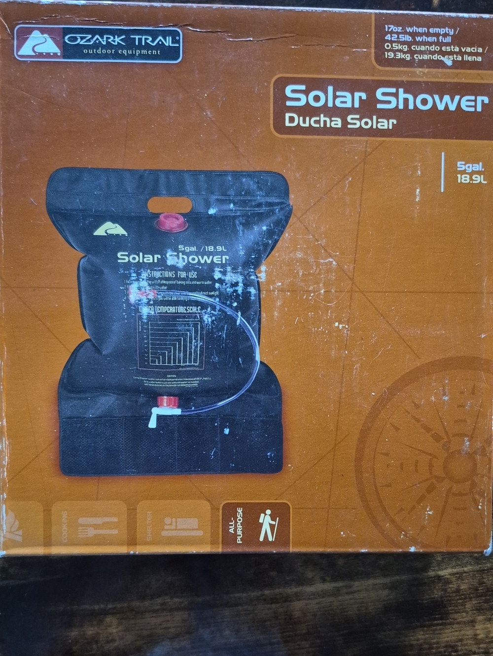 Ozark Trail Brown Solar Shower Pack with White Graphics